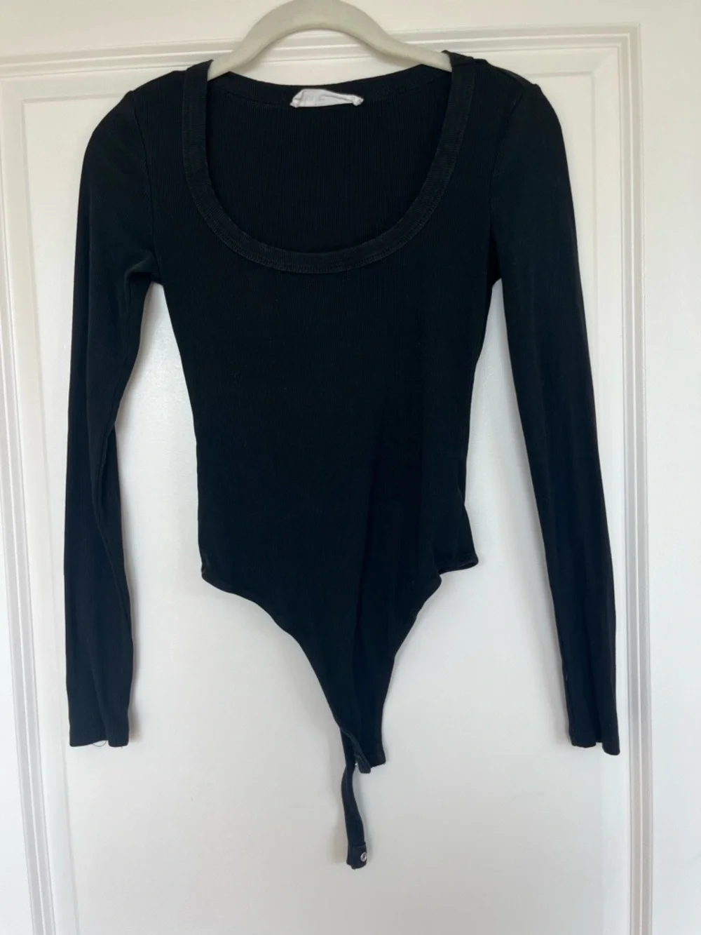 Elodie Black Long-Sleeve Scoop Neck Bodysuit with Snap Hem
